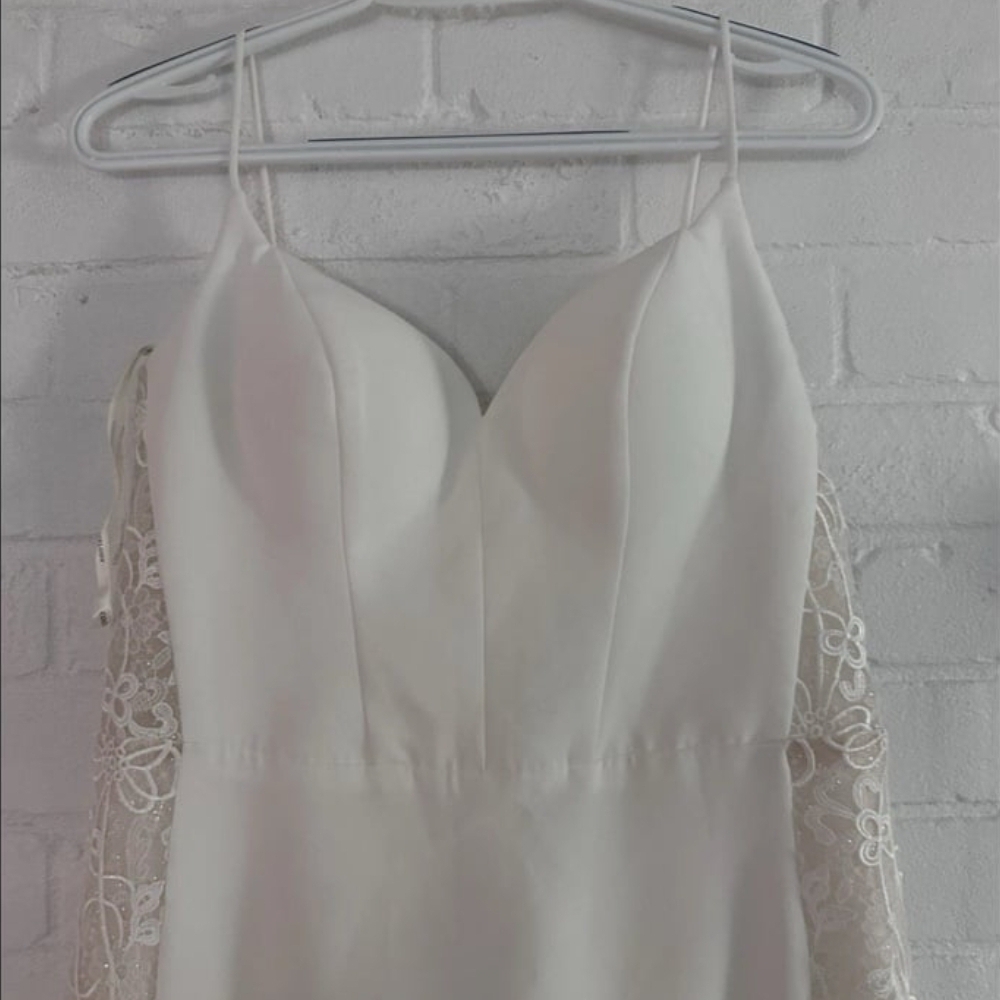 Elegant Cream Dress with Lace Sides